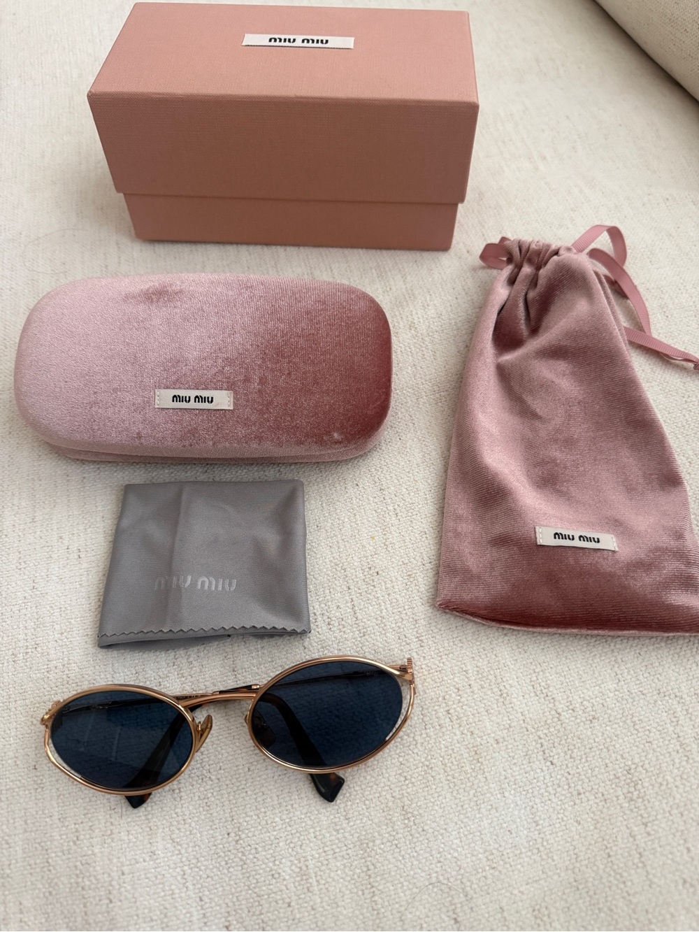 Miu Miu Oval Logo Sunglasses